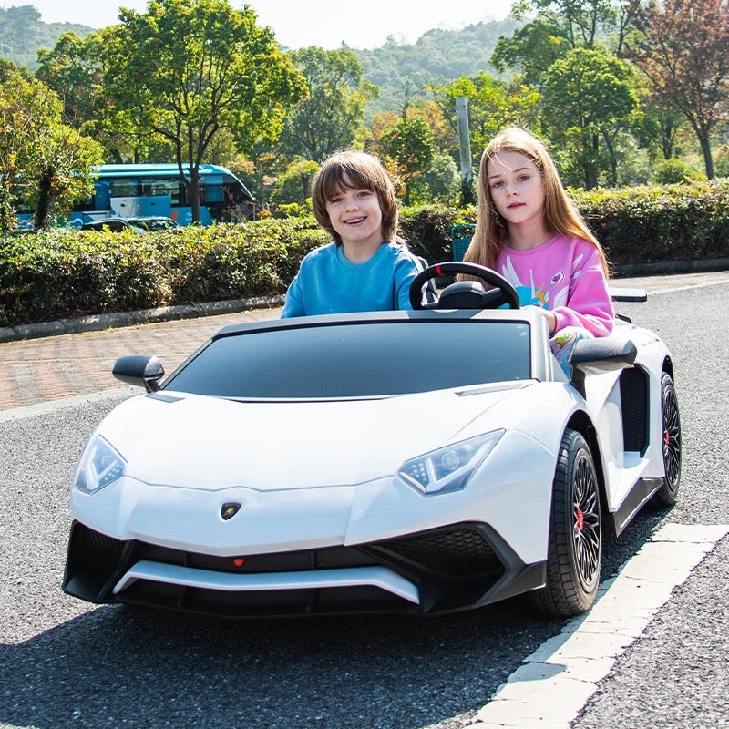 HUGE SIZE 24V LAMBORGHINI BRUSHLESS MOTOR (AGE: 6+, HIGH SPEED 18MPH, AIR RUBBER WHEELS, FOOT&HAND BRAKE (DISK) TOUCHSCREEN TV, LEATHER SEATS)